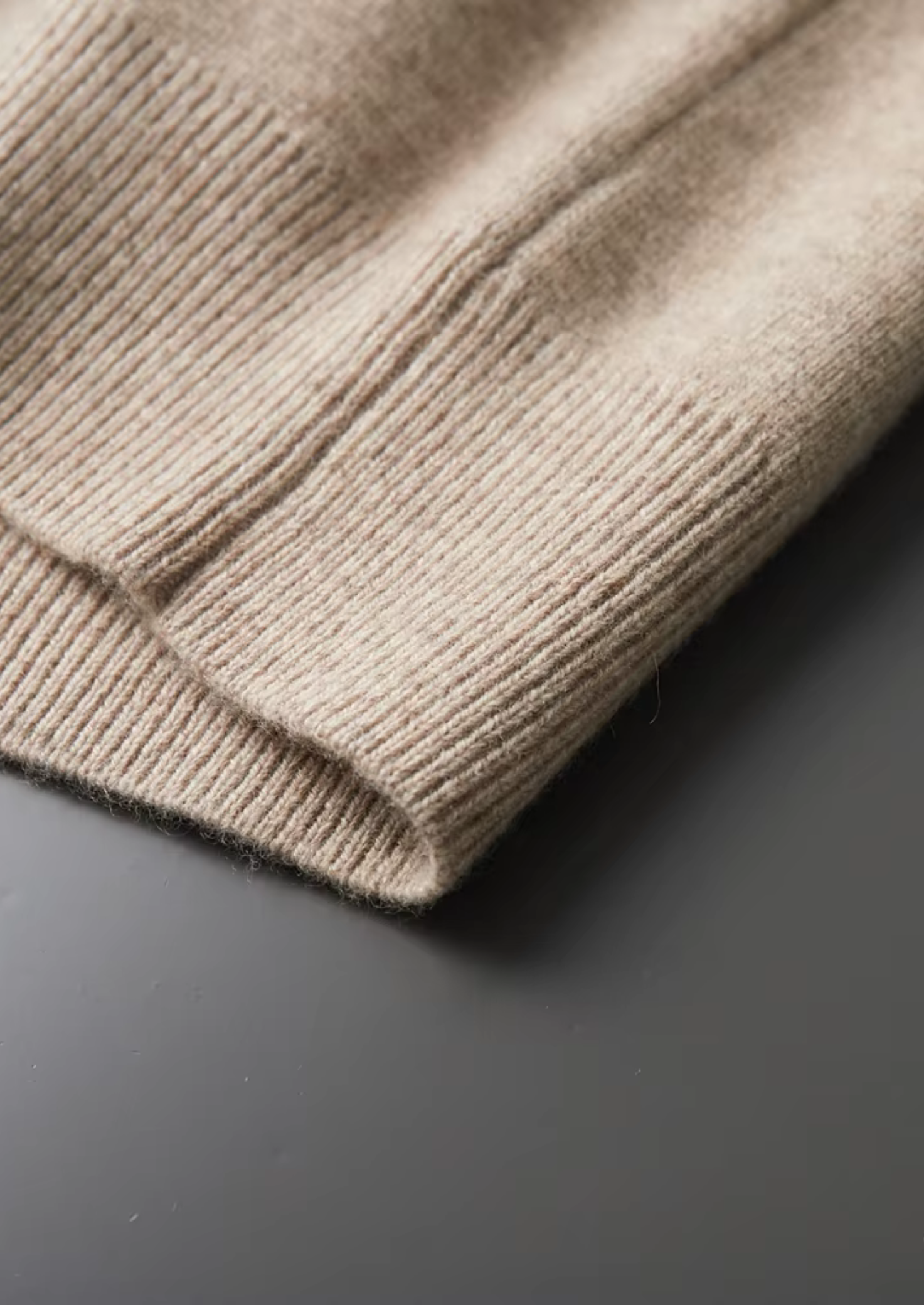 CARDIGÁN POLO CON CREMALLERA DE LANA MERINA EXTRAFINA